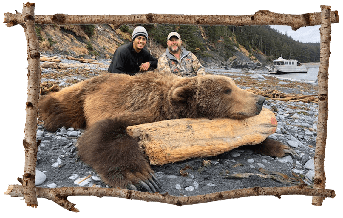 hunter and guide with bear