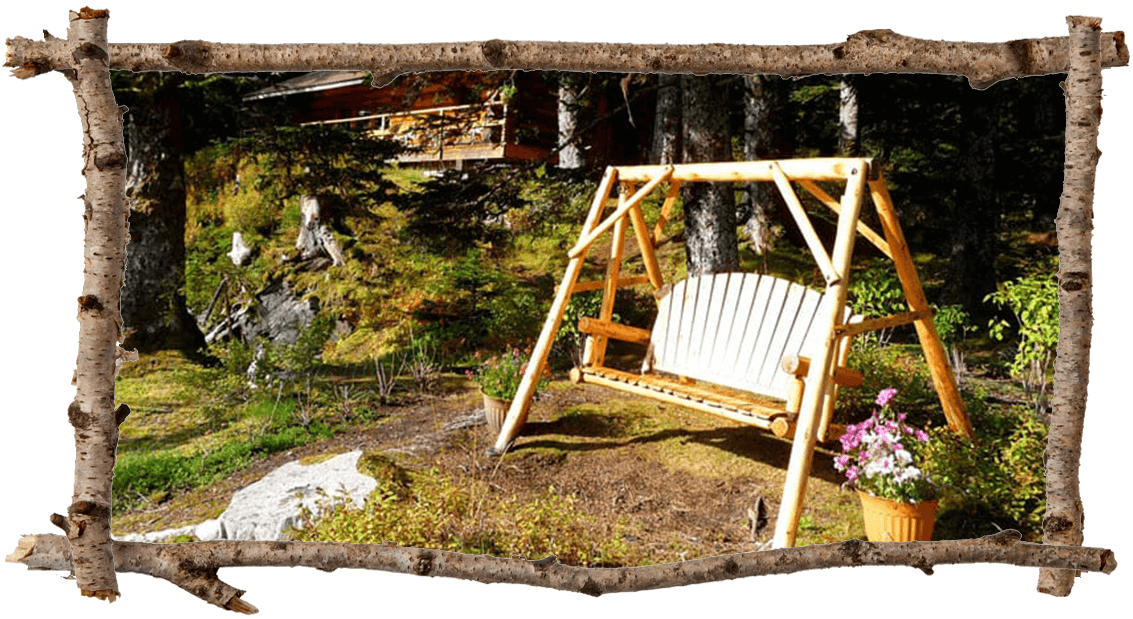 Cabin 2 exterior wooden bench swing