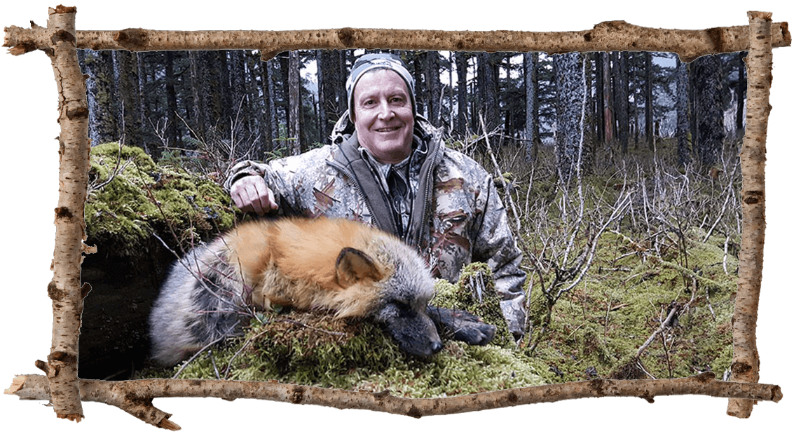 hunter with fox