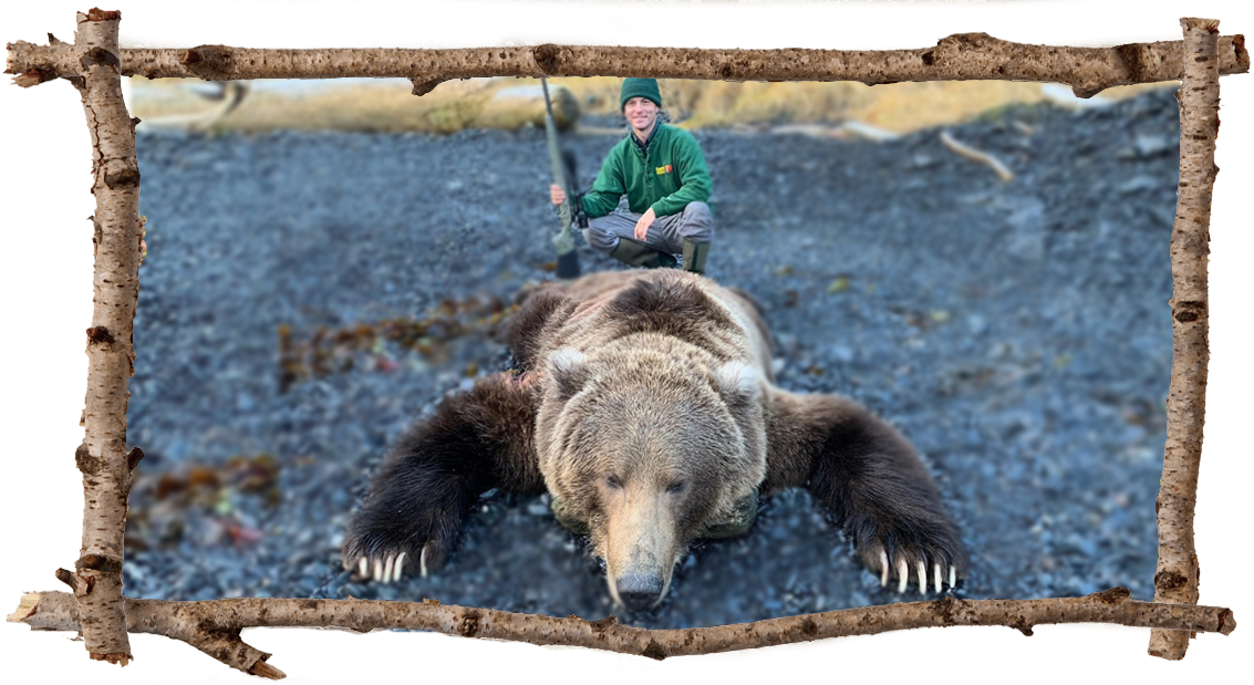 Man posing with large bear