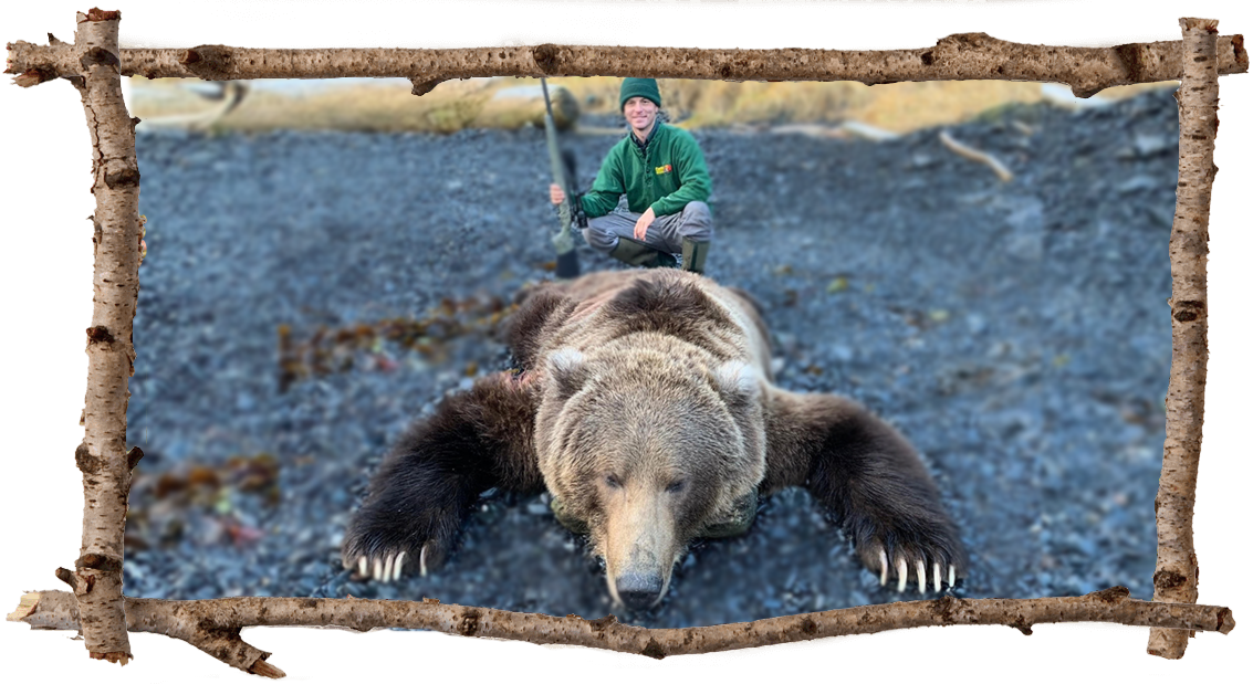 Man posing with large bear